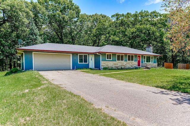 20257 Viking Blvd NE, Wyoming, MN 55092 - ranch-style home featuring an attached garage, stone siding, concrete driveway, a front yard, and a chimney