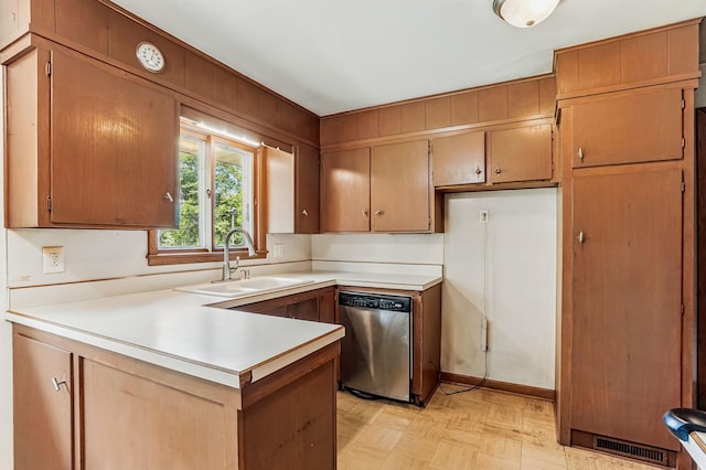 20257 Viking Blvd NE, Wyoming, MN 55092 - kitchen with dishwasher, a sink, a peninsula, and light countertops