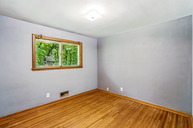 20257 Viking Blvd NE, Wyoming, MN 55092 - empty room with wood finished floors and baseboards