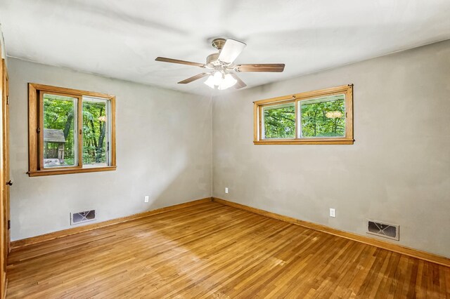 20257 Viking Blvd NE, Wyoming, MN 55092 - spare room featuring wood finished floors, ceiling fan, and baseboards