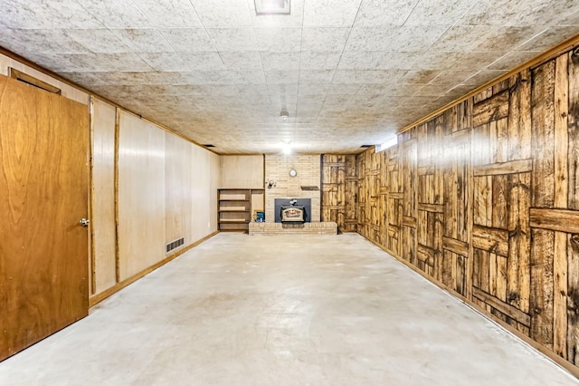 20257 Viking Blvd NE, Wyoming, MN 55092 - finished basement with wooden walls and a fireplace