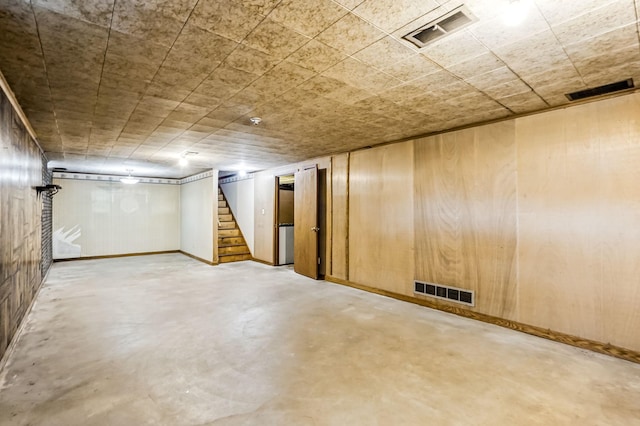 20257 Viking Blvd NE, Wyoming, MN 55092 - finished below grade area with stairway, wood walls, and baseboards