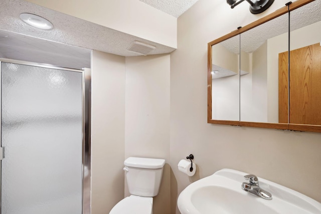 11813 Kerry St NW, Coon Rapids, MN 55433 - bathroom featuring a textured ceiling and a shower stall