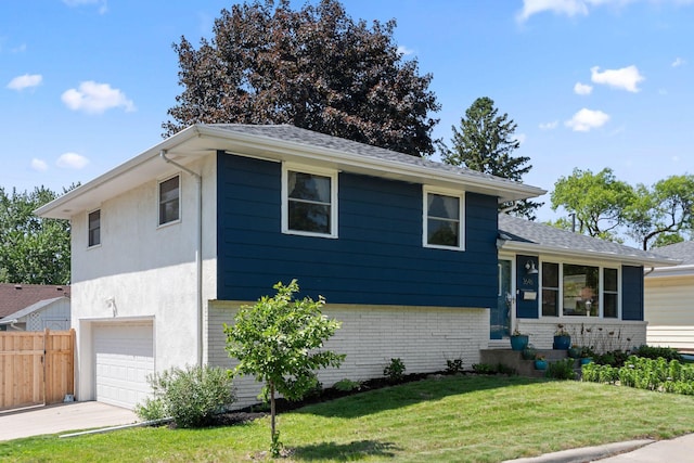 3646 Buchanan St NE, Minneapolis, MN 55418 - view of front of property featuring brick siding, concrete driveway, an attached garage, and roof with shingles