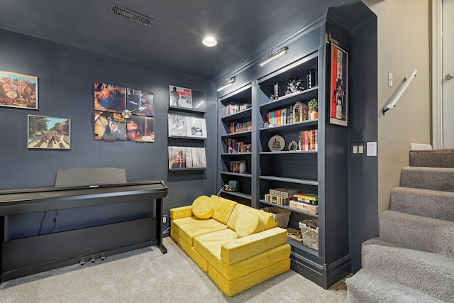 3646 Buchanan St NE, Minneapolis, MN 55418 - living area with carpet floors, stairway, and built in shelves