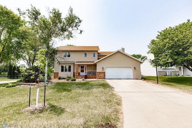1727 33rd St S, Moorhead, MN 56560 - view of front facade featuring a garage, a front yard, driveway, brick siding, and a chimney