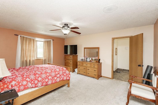 1727 33rd St S, Moorhead, MN 56560 - bedroom with light colored carpet, a textured ceiling, and ceiling fan