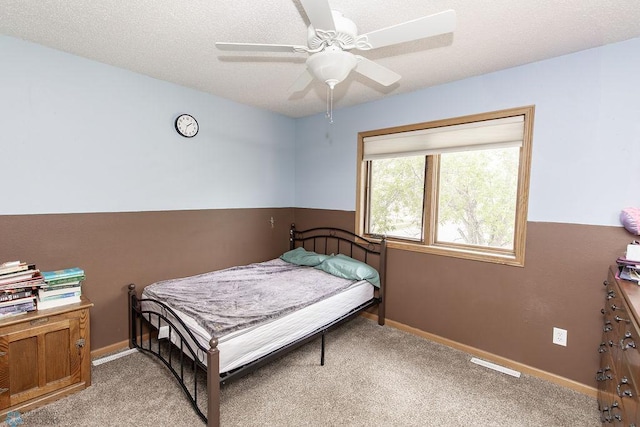 1727 33rd St S, Moorhead, MN 56560 - bedroom with light carpet, baseboards, and a ceiling fan