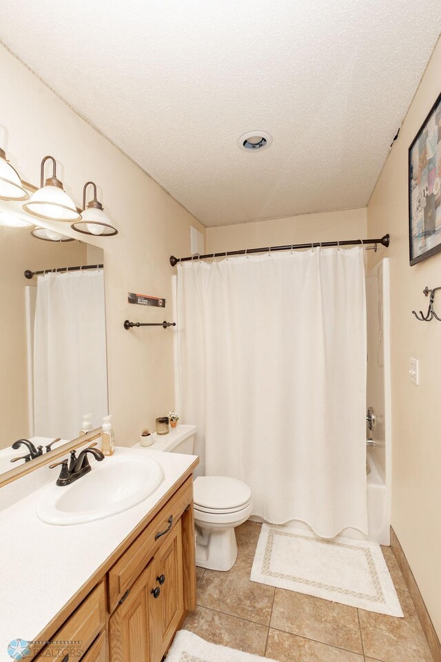 1727 33rd St S, Moorhead, MN 56560 - full bathroom with vanity, toilet, and shower / bath combo