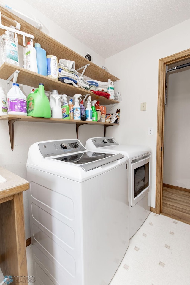 1727 33rd St S, Moorhead, MN 56560 - washroom with separate washer and dryer and tile patterned floors