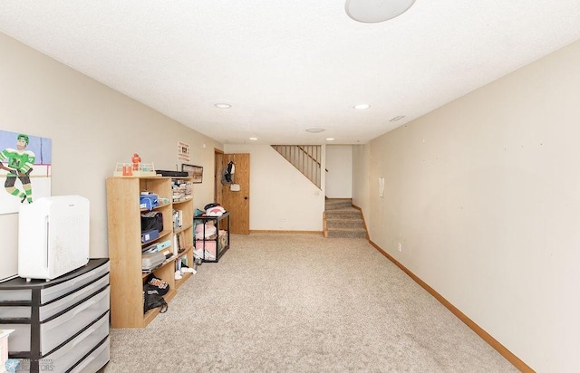 1727 33rd St S, Moorhead, MN 56560 - finished basement with stairway, carpet, baseboards, and recessed lighting
