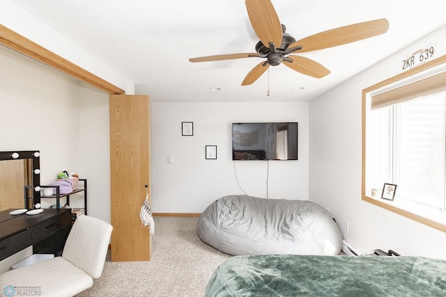 1727 33rd St S, Moorhead, MN 56560 - bedroom with carpet floors, a ceiling fan, and baseboards