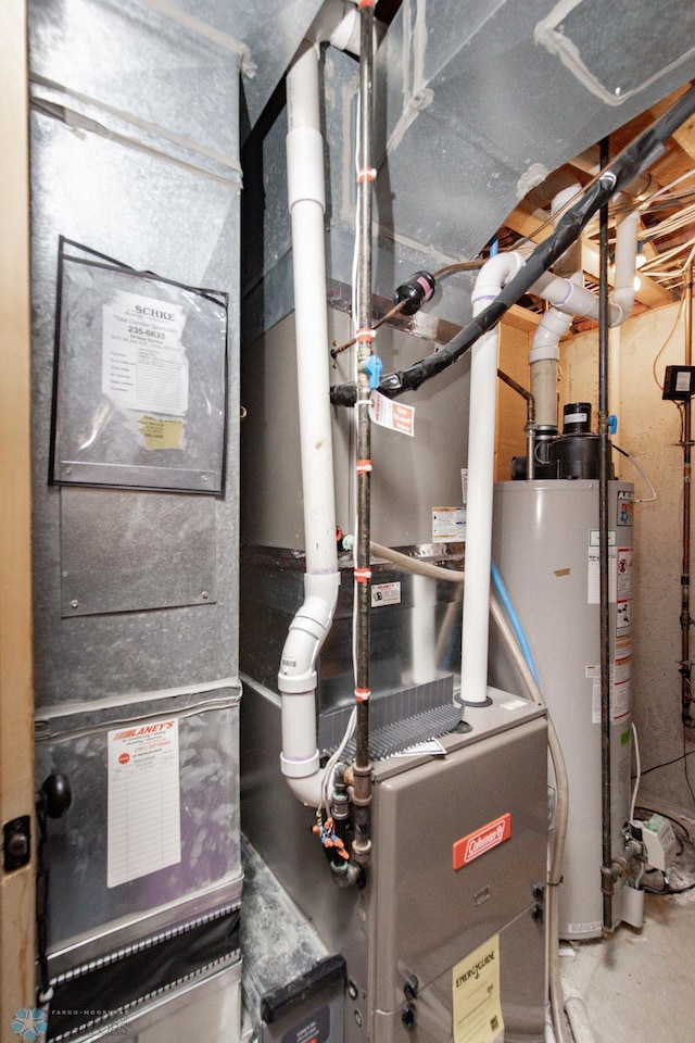 1727 33rd St S, Moorhead, MN 56560 - utility room featuring gas water heater