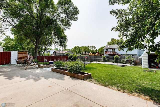 1727 33rd St S, Moorhead, MN 56560 - view of patio / terrace with a garden