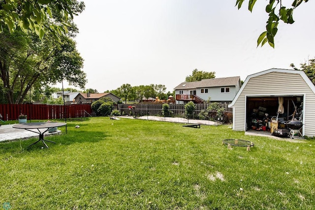 1727 33rd St S, Moorhead, MN 56560 - view of yard featuring a detached garage