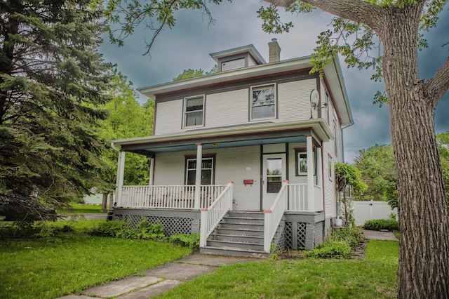 210 6th St, Morris, MN 56267 - traditional style home featuring a porch and a chimney