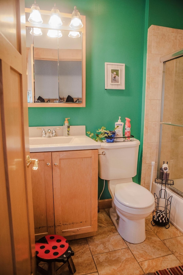 210 6th St, Morris, MN 56267 - full bathroom featuring vanity, toilet, shower / bathtub combination, and tile patterned flooring