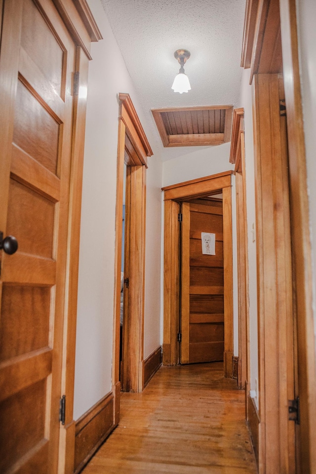 210 6th St, Morris, MN 56267 - hallway featuring wood finished floors