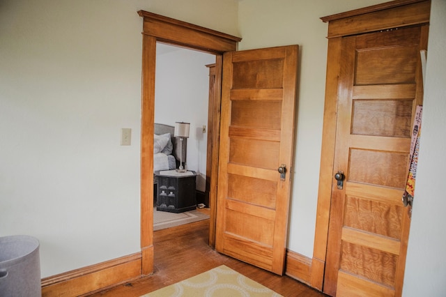 210 6th St, Morris, MN 56267 - hallway with wood finished floors and baseboards
