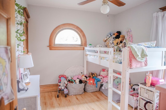 210 6th St, Morris, MN 56267 - bedroom featuring wood finished floors and a ceiling fan