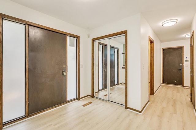 2723 Innsbruck Dr, New Brighton, MN 55112 - entryway with light wood finished floors and baseboards