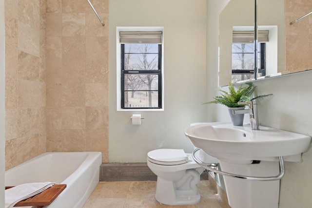 2201 3rd Ave S Unit 102, Minneapolis, MN 55404 - full bath featuring toilet, healthy amount of natural light, and bathtub / shower combination