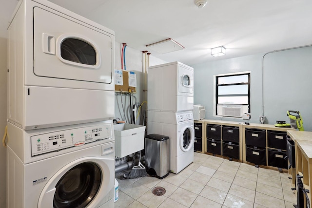2201 3rd Ave S Unit 102, Minneapolis, MN 55404 - laundry room with stacked washing machine and dryer, a sink, light tile patterned flooring, and cooling unit