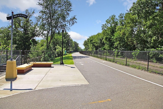 2201 3rd Ave S Unit 102, Minneapolis, MN 55404 - view of road with street lighting and view of wooded area