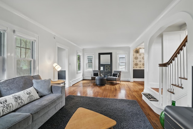 4848 Ewing Ave S, Minneapolis, MN 55410 - living room featuring wood finished floors, healthy amount of natural light, ornamental molding, and stairs