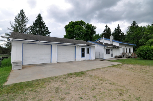 24892 277th Ave, Akeley Twp, MN 56467 - view of front facade with an outdoor structure, a chimney, and a garage