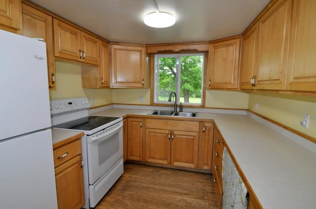 24892 277th Ave, Akeley Twp, MN 56467 - kitchen featuring white appliances, light countertops, dark wood finished floors, and brown cabinets