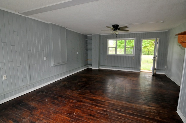 24892 277th Ave, Akeley Twp, MN 56467 - unfurnished room with hardwood / wood-style floors, a ceiling fan, and wood walls