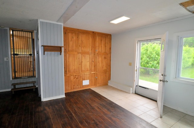 24892 277th Ave, Akeley Twp, MN 56467 - unfurnished room with baseboards and hardwood / wood-style flooring