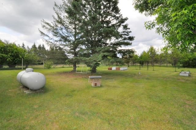 24892 277th Ave, Akeley Twp, MN 56467 - view of green lawn featuring view of wooded area