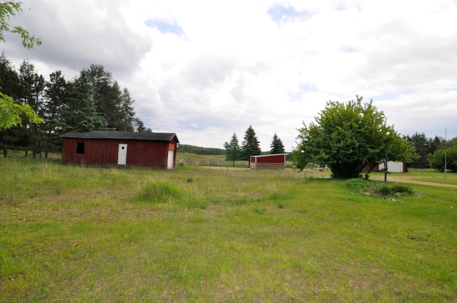 24892 277th Ave, Akeley Twp, MN 56467 - view of yard with an outbuilding