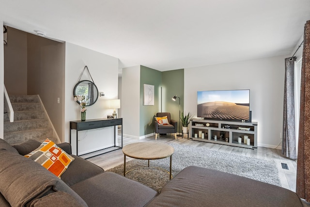 9106 Neill Lake Rd, Eden Prairie, MN 55347 - living room featuring wood finished floors and stairway