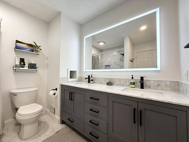 9106 Neill Lake Rd, Eden Prairie, MN 55347 - full bath featuring double vanity, marble finish floors, and a shower with shower curtain