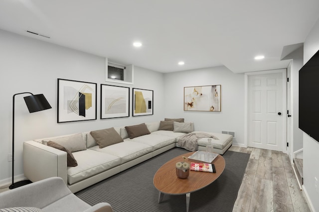 9106 Neill Lake Rd, Eden Prairie, MN 55347 - living room with light wood-style flooring and recessed lighting