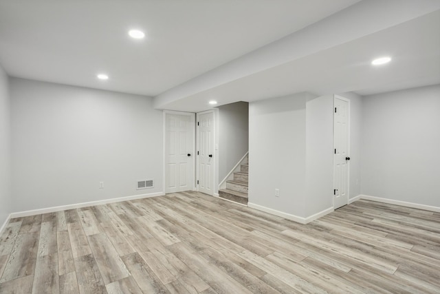 9106 Neill Lake Rd, Eden Prairie, MN 55347 - finished basement with stairs, light wood-style floors, and recessed lighting