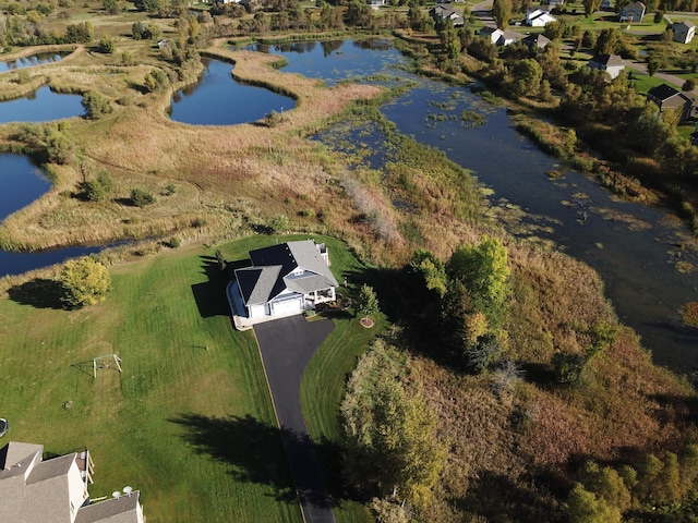 7720 242nd St, Wyoming, MN 55025 - aerial view of property and surrounding area featuring a nearby body of water and nearby suburban area