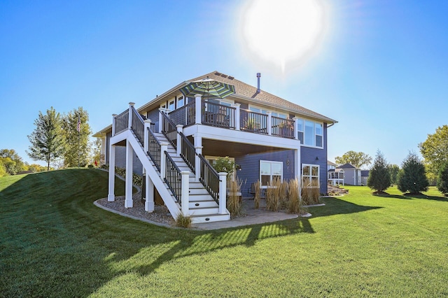 7720 242nd St, Wyoming, MN 55025 - back of house with a lawn, stairway, and a wooden deck