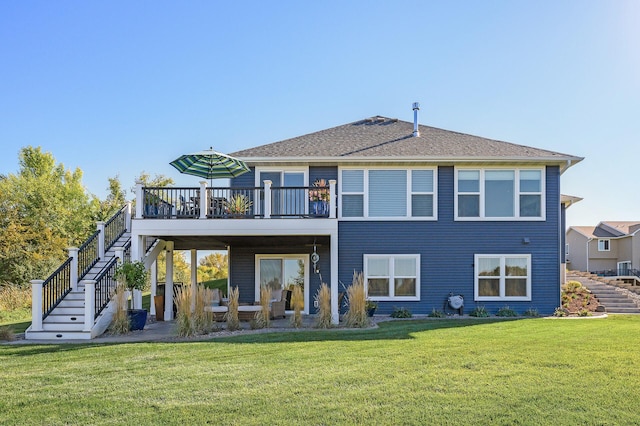 7720 242nd St, Wyoming, MN 55025 - rear view of house with stairs, a deck, a yard, and a patio area