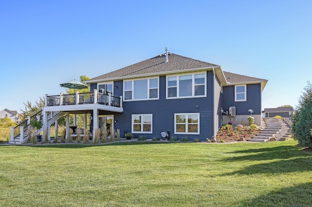 7720 242nd St, Wyoming, MN 55025 - rear view of house featuring stairway, a deck, and a yard
