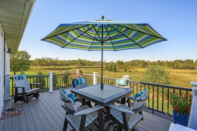 7720 242nd St, Wyoming, MN 55025 - wooden terrace with outdoor dining space