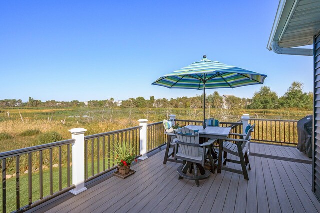 7720 242nd St, Wyoming, MN 55025 - deck featuring outdoor dining area