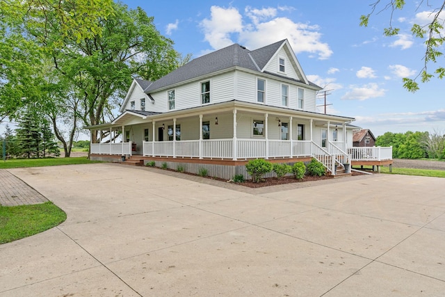 27151 Aberdeen Ave, New Prague, MN 56071 - farmhouse featuring covered porch, concrete driveway, and a shingled roof