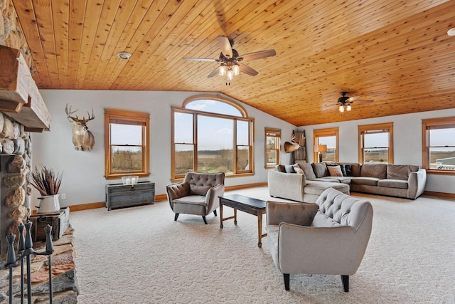 27151 Aberdeen Ave, New Prague, MN 56071 - carpeted living area featuring ceiling fan, vaulted ceiling, baseboards, a fireplace, and wood ceiling