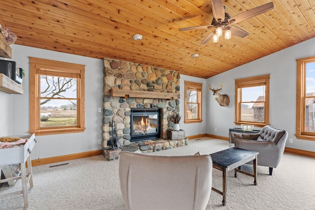 27151 Aberdeen Ave, New Prague, MN 56071 - living area featuring carpet, plenty of natural light, baseboards, wood ceiling, and a fireplace