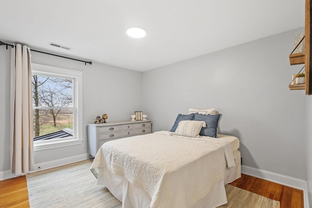 27151 Aberdeen Ave, New Prague, MN 56071 - bedroom with baseboards and light wood finished floors