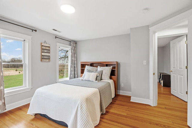 27151 Aberdeen Ave, New Prague, MN 56071 - bedroom with baseboards and light wood-style floors
